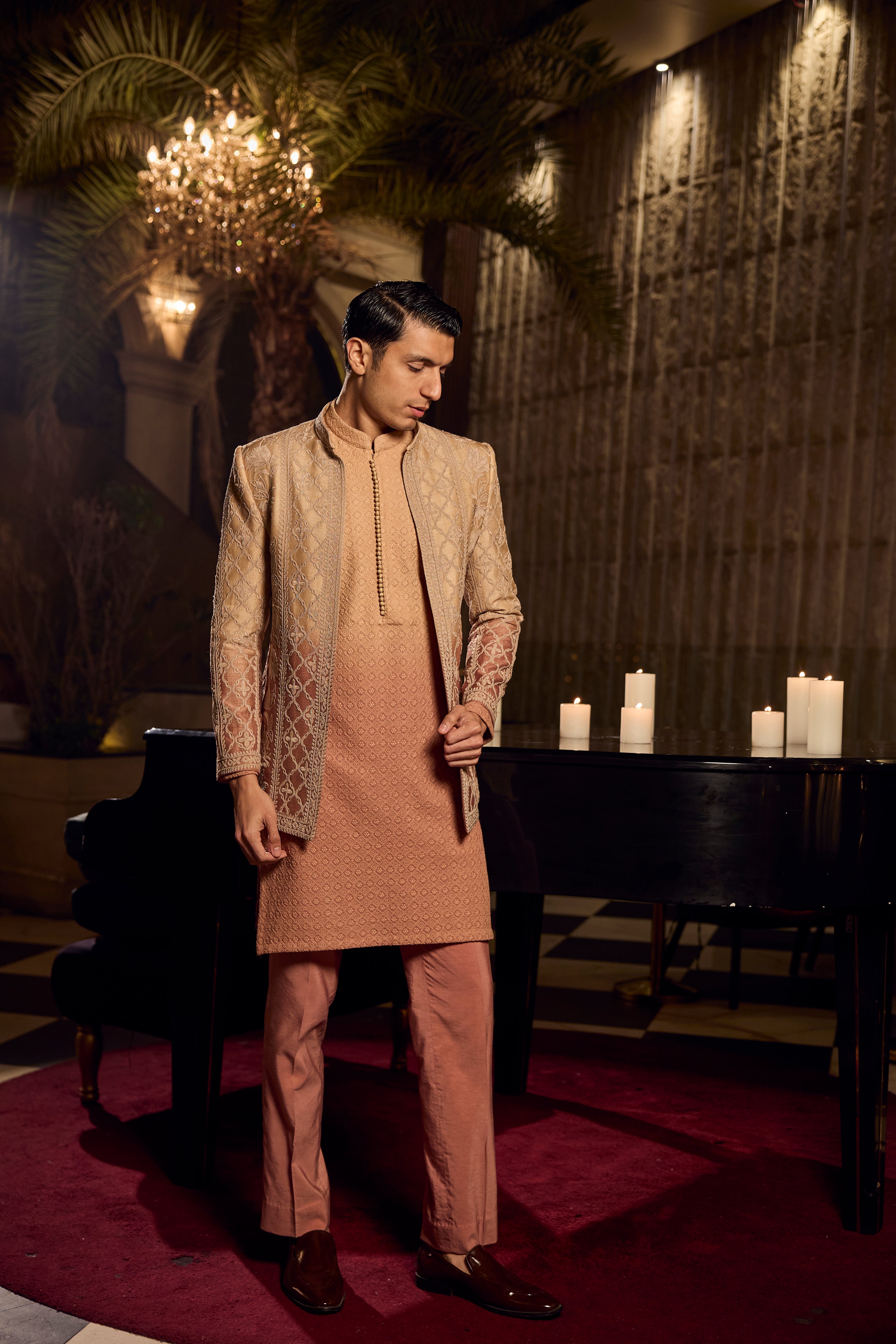 Peach Textured Kurta–Bundi Ensemble with Golden Embroidered Jacket