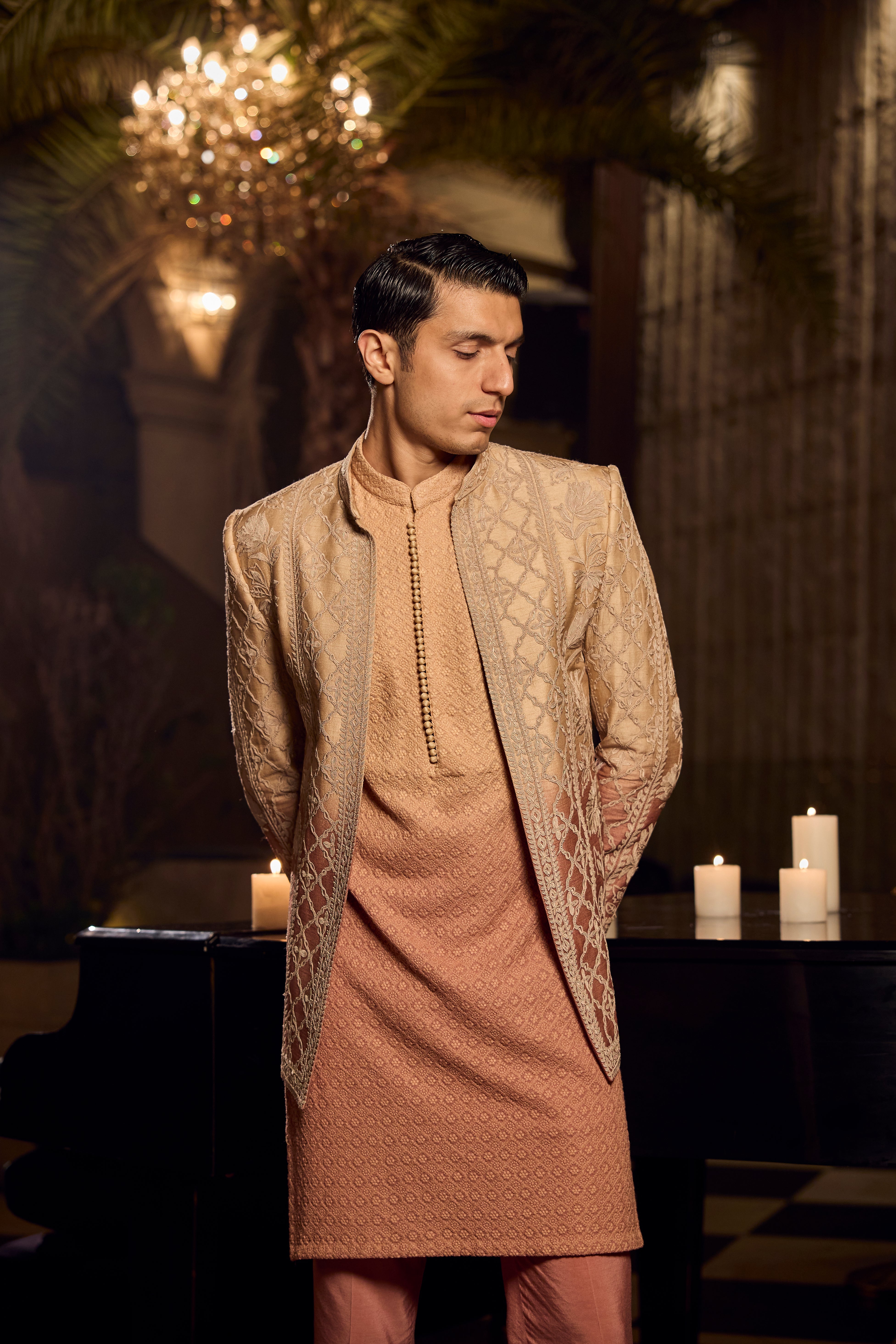 Peach Textured Kurta–Bundi Ensemble with Golden Embroidered Jacket