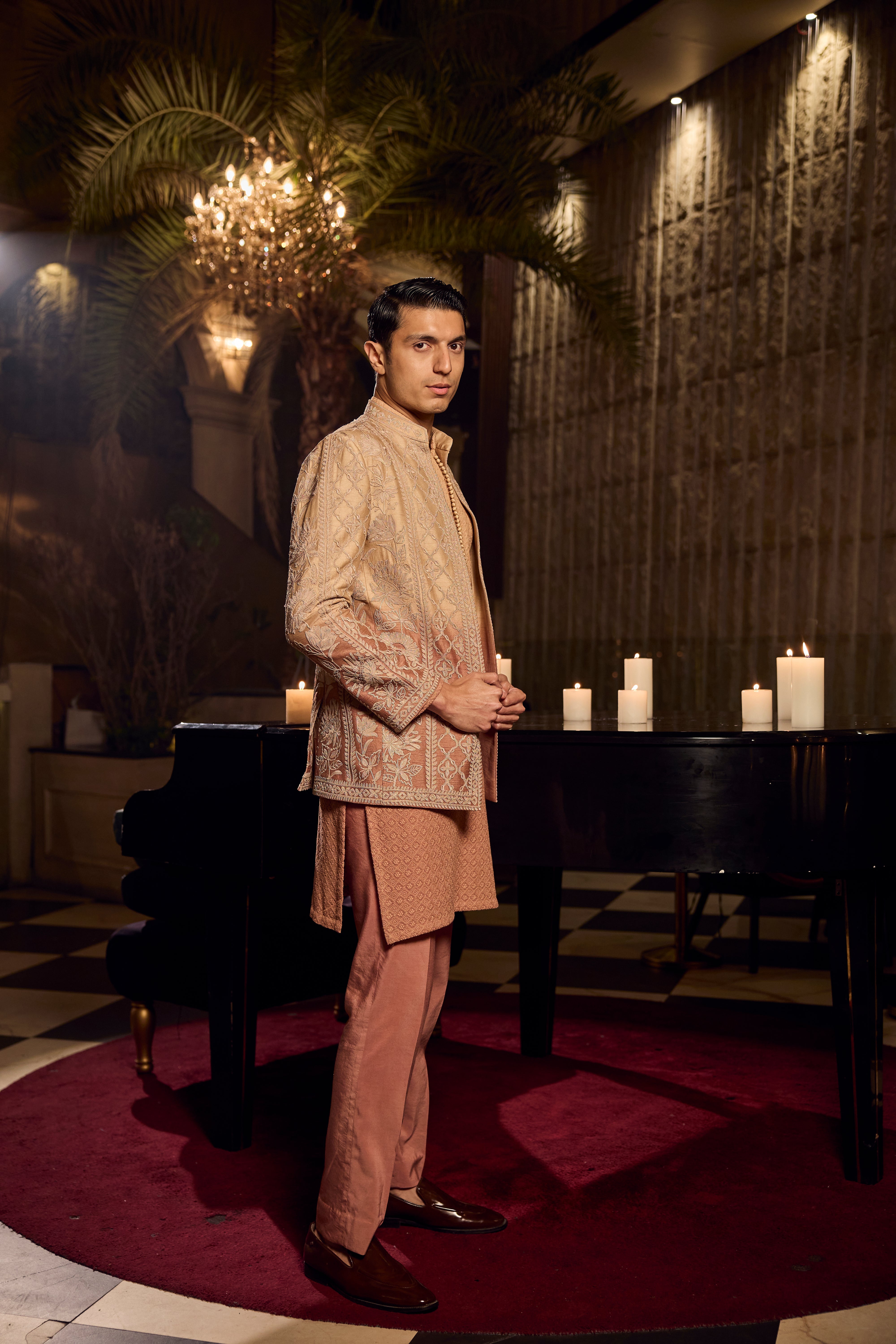 Peach Textured Kurta–Bundi Ensemble with Golden Embroidered Jacket
