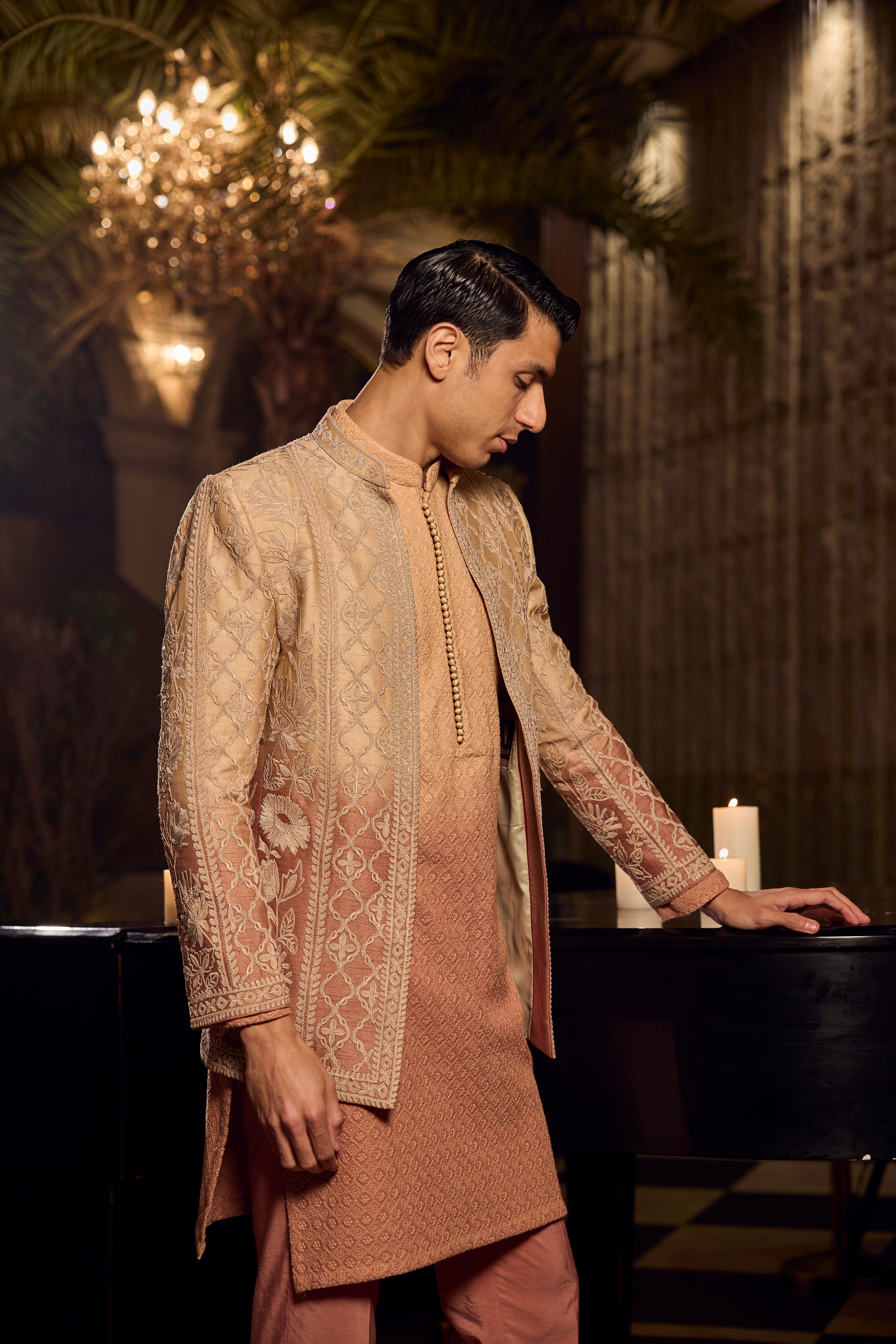 Peach Textured Kurta–Bundi Ensemble with Golden Embroidered Jacket