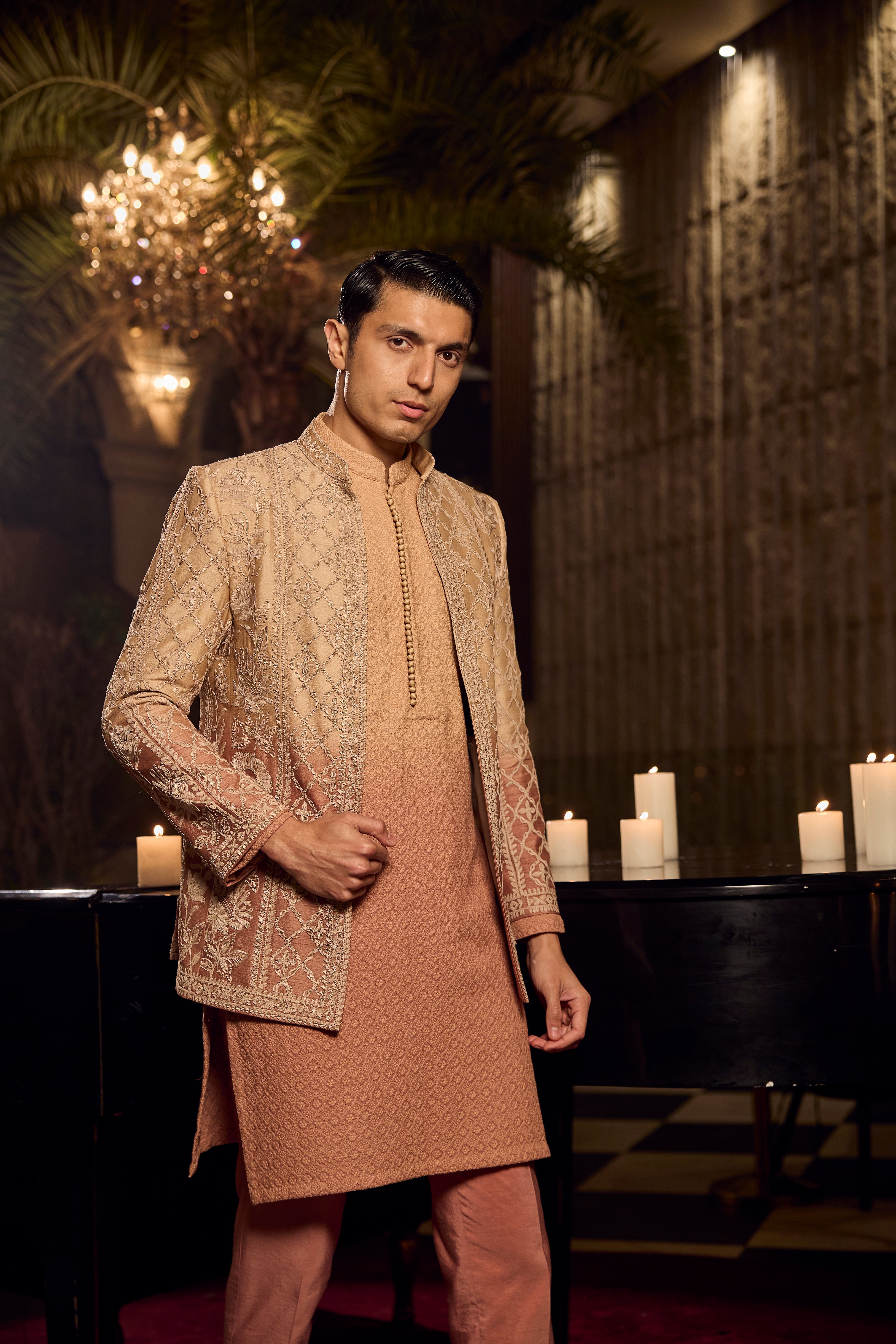 Peach Textured Kurta–Bundi Ensemble with Golden Embroidered Jacket