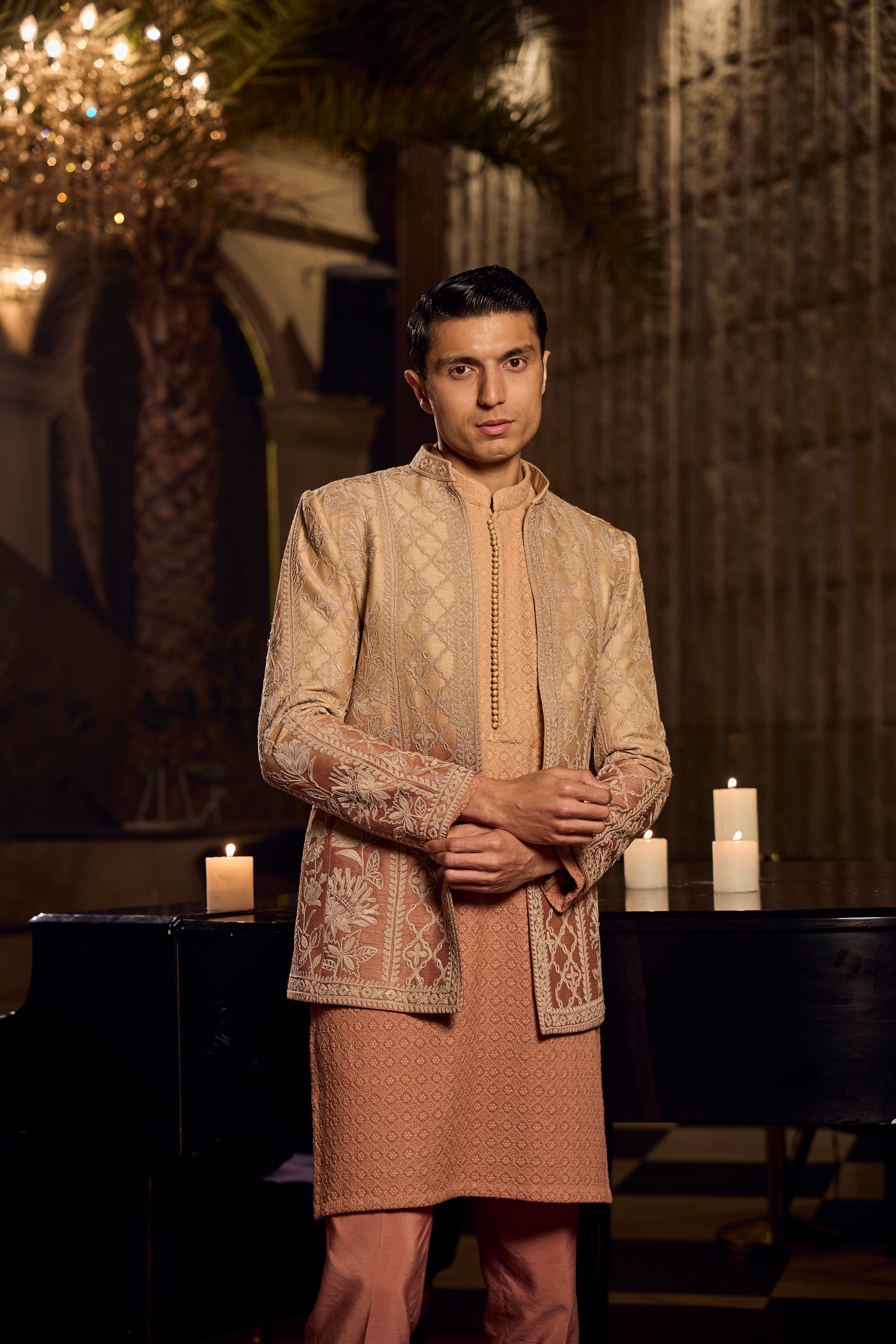 Peach Textured Kurta–Bundi Ensemble with Golden Embroidered Jacket
